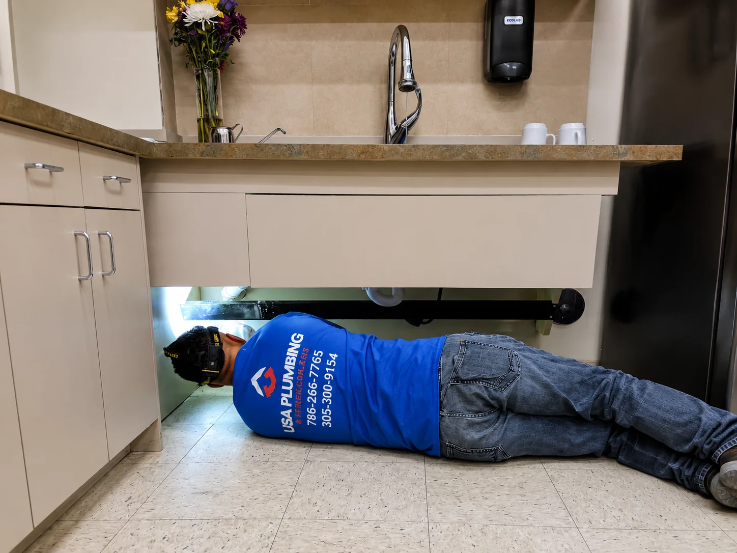 Emergency plumbing repair under-sink service by USA Plumbing and Trenchless